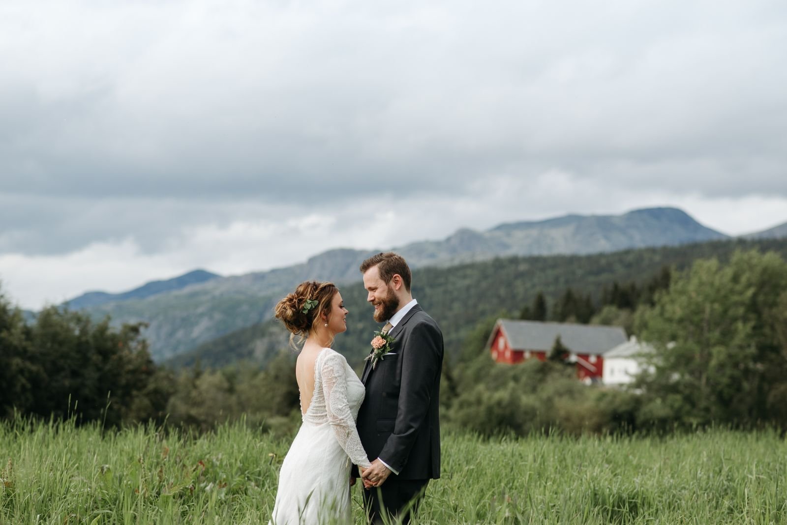 Bride and groom posing in green nature