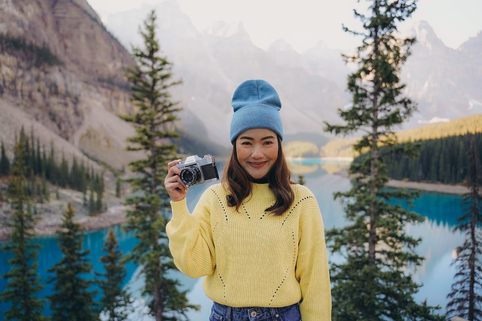 Visitor with a camera at Peyto Lake