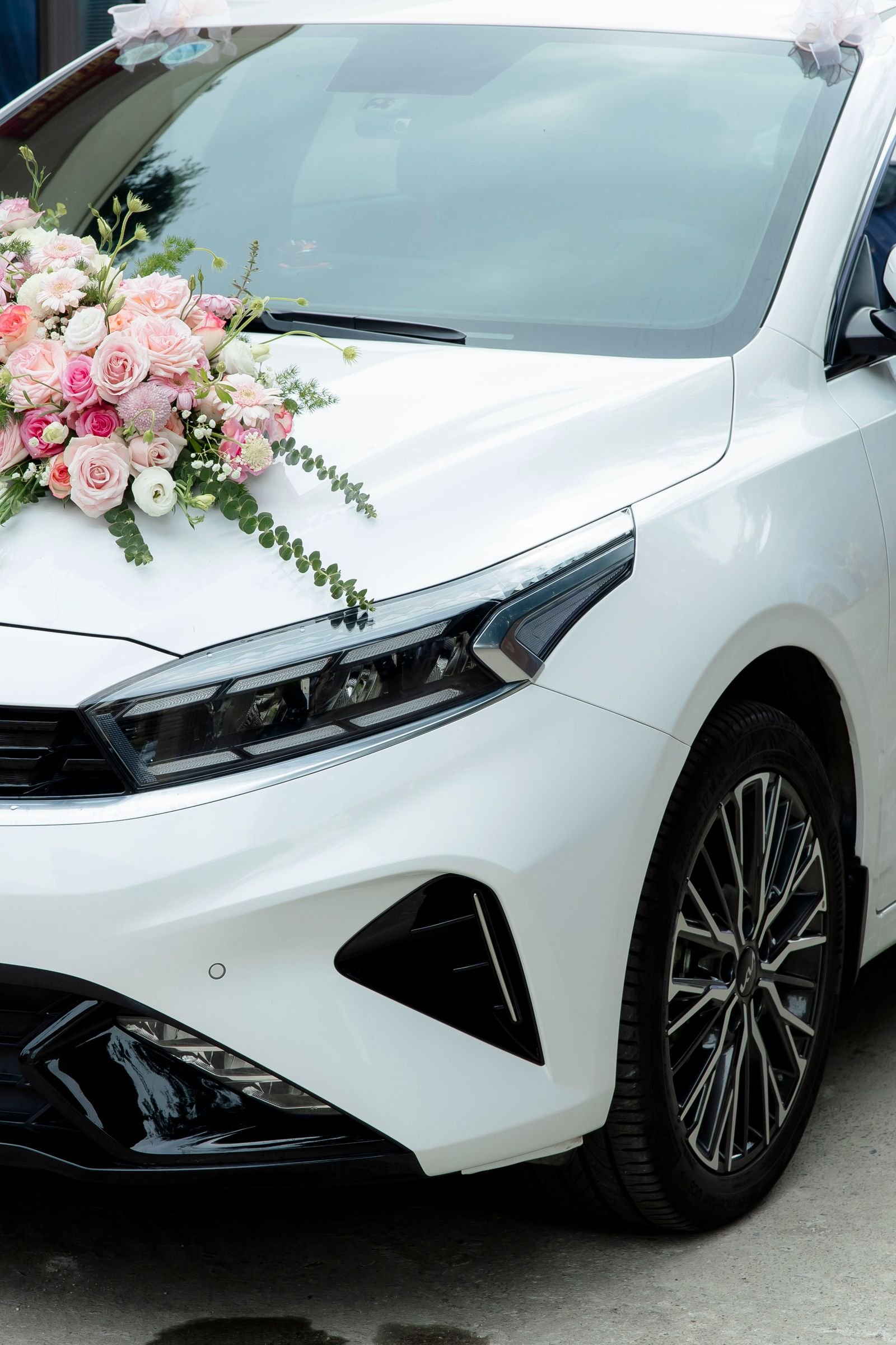 Wedding car decorated with flowers
